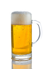 glass of beer with foam on a white background