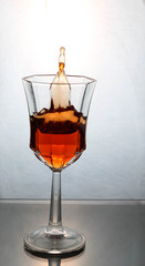 wine splashing in a glass