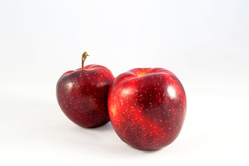 Red apple closeup isolated on white background