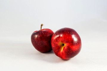 Red apple closeup isolated on white background