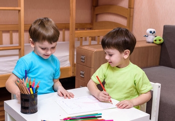 Kids drawing together at home
