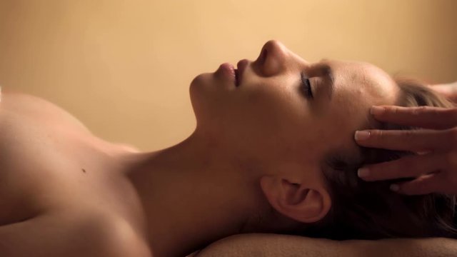 Beautiful woman having a facial massage