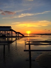 Obraz premium Sonnenuntergang im Wattenmeer von St. Peter-Ording
