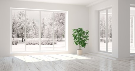 White empty room with winter landscape in window. Scandinavian interior design