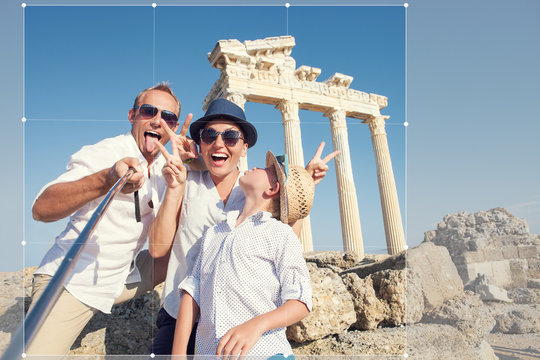 Funny family take a selfie photo on Apollo Temple colonnade view in Side, Turkey