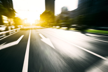 traffic on road in midtown of modern city