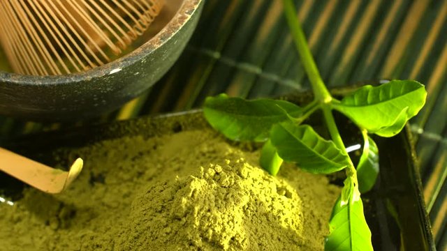 Matcha powder. Organic green matcha tea. Dolly shot. UHD video footage. Ultra high definition 3840X2160