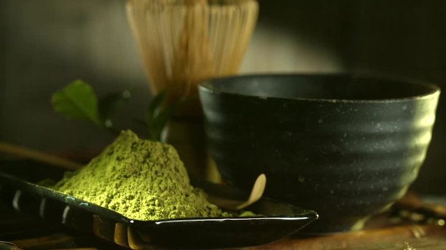 Matcha powder. Organic green matcha tea. Rotation. UHD video footage. Ultra high definition 3840X2160