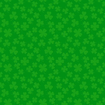 Clover leaves seamless vector pattern. St. Patrick's Day green background. Shamrock wallpaper