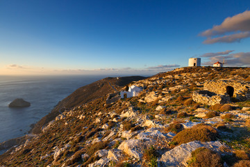 Windmills on the coast of Amorgos island early in the morning.