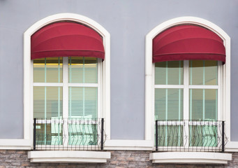 red awning over window balcony