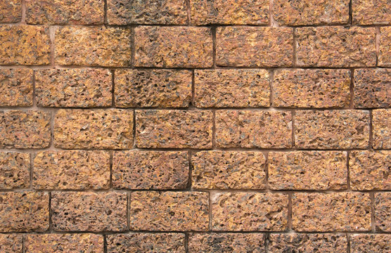 laterite wall, red brick panel