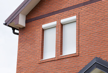 Modern private house with jalousie on windows