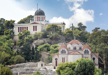 Exterior view of The Church Of Agia Marina (down) and National Observatory of Athens (up), Greece.