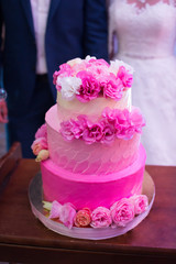 Wedding cake with fresh flowers