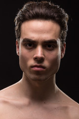 Obraz premium intense angry young man head face closeup jawline
