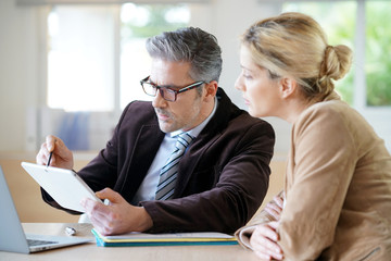 Woman meeting notary for advice