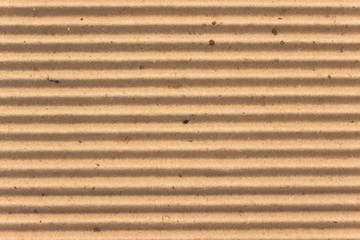 Texture of brown corrugate cardboard as background
