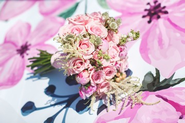 Beautiful wedding colorful bouquet for bride. Beauty of colored flowers. Close-up bunch of florets. Bridal accessories. Female decoration for girl. Details for marriage and for married couple