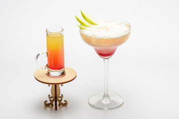 cocktails: sex on the beach and margarita on decorative table