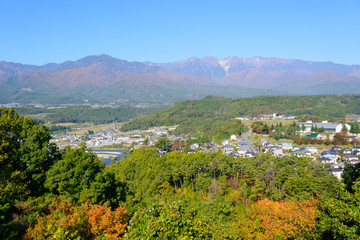 長野　秋の中央アルプスと伊那盆地の町並み