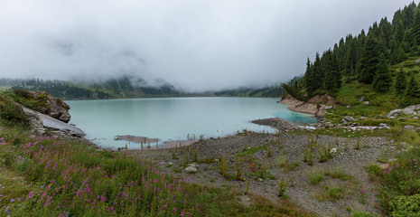 thick white mist over the Big Almaty Lake