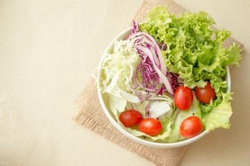 Vegetable salad and cream top view. copy space.