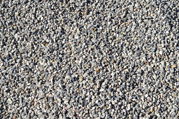 Kieselsteine, feiner Sand