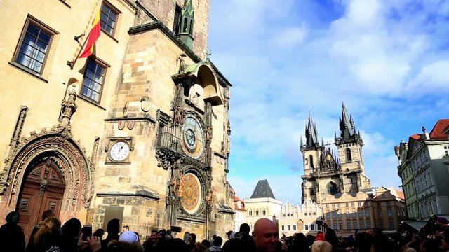 Time lapse The medieval astronomical clock and Church of Our Lady before Tyn  in the Old Town square in Prague Czech republic 02 Feb 2017