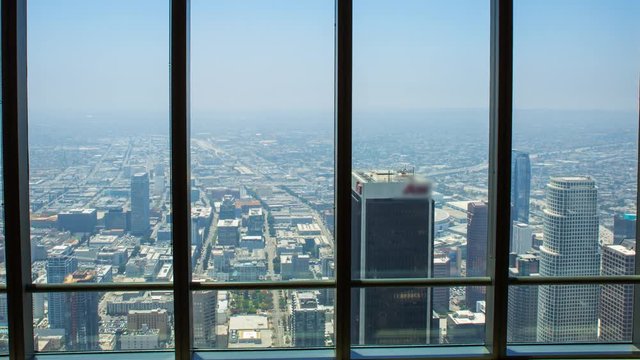 MoCo Pan Timelapse of LA Cityscape thru Top Floor at US Bank Tower 72F Long Shot