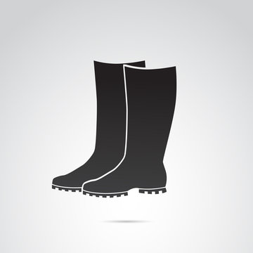 Rubber boots vector icon.