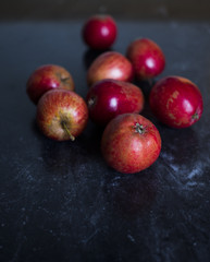 pigeon apples on black marble