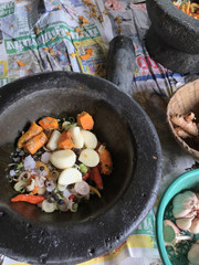 Raw food for making curry paste, Curry in mortar