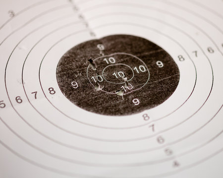 Shooting target with bullet holes