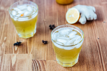 Alcohol free home ginger beer on glass on wooden surface