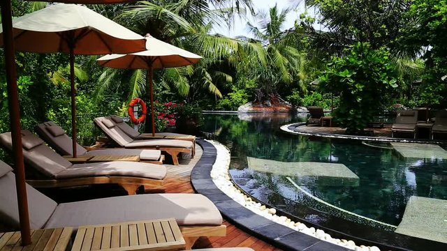 beach garden swimming pool,tropical paradise at Iruveli island, Maldives.