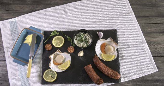 Stop motion view of ingredients for scallops with chorizo in garlic mayonnaise