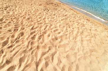 Blue sea  and  sandy beachBackground in summer day.