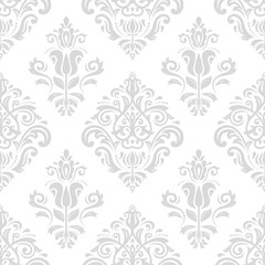 Elegant classic pattern. Seamless abstract background with repeating elements. Light silver pattern