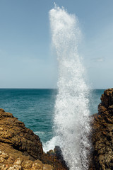 Wave between the rocks