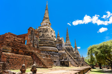 Fototapeta premium Ancient Pagoda in Wat Phrasisanpetch (Phra Si Sanphet). Ayutthaya historical city, Thailand