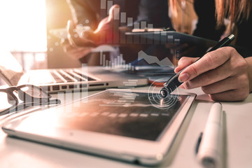 Business team meeting present.professional investor working with new startup project. Finance managers task.Digital tablet laptop computer design smart phone in morning light