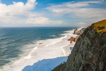 Cabo da Roca. Cliffs and rocks on the Atlantic ocean coast in Sintra in a beautiful summer day, Portugal