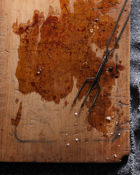 Meat juice on cutting board