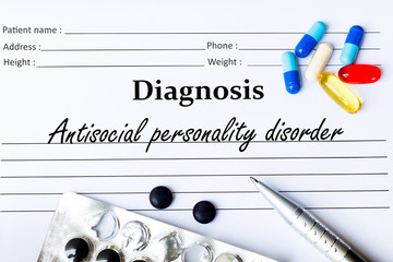 Antisocial personality disorder - Diagnosis written on a piece of white paper with medication and...