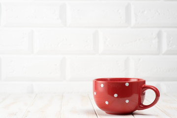 Red cup on the kitchen table