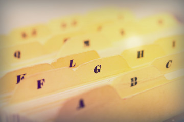 Close up of alphabetical index cards in box