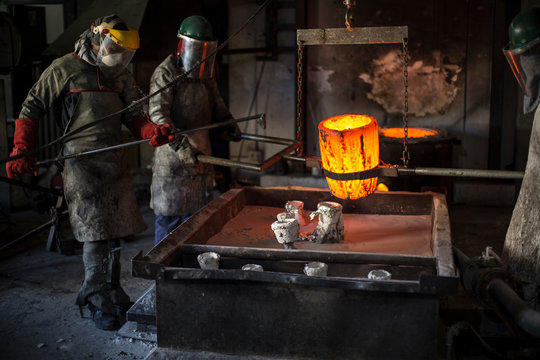 Metalworkers working in foundry