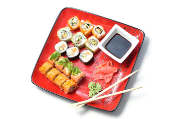 Sushi on a red plate with hieroglyph