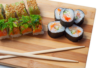 Sushi on a bamboo cutting board